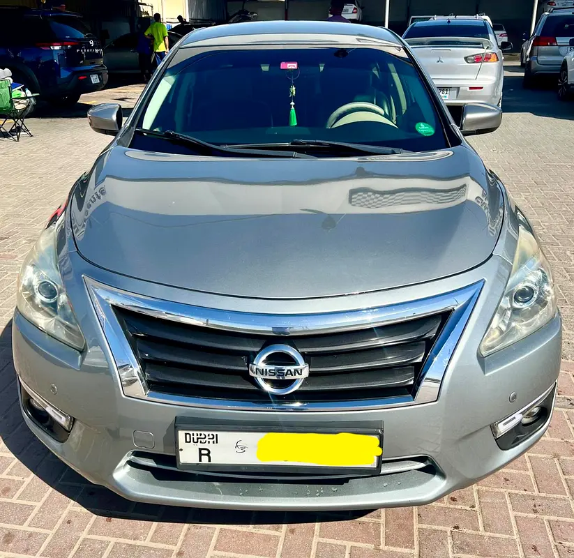 Nissan Altima 2014 — photo 1 of 17