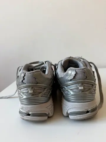 Used ONCE pair of grey New Balance sneakers - size available