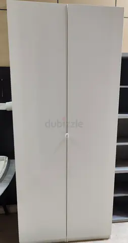 White Tall Wardrobe / Armoire - 2 Door/ Large shoe rack in excellent condition for sale free deliver