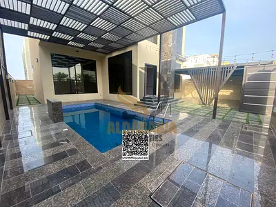 A rare opportunity to rent a fully furnished luxury villa with a covered swimming pool in Al Alia, Ajman. Offering spacious living areas, premium
