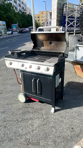 Used 4-Burner Gas BBQ Grill with Side Burner - Good Working Condition