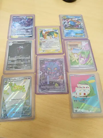 Assorted Pokémon TCG Rare  Holo Card Lot — 8 Sleeved Cards (Blastoise, Charizard  Zekrom GXs)