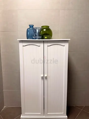 White freestanding storage cabinet with two doors