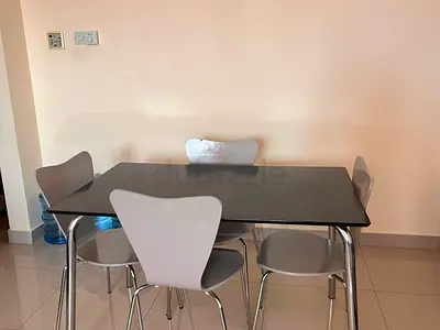 Modern black dining table with 4 grey chairs - good condition
