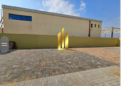 🏭 مستودع مفتوح رئيسي للإيجار – واحة الصجعة الصناعية