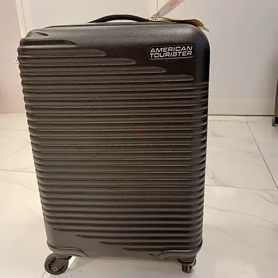 American Tourister Sky Park Suitcase – Made of ABS Material – 360° Spinner Wheels – Small Size (55 c