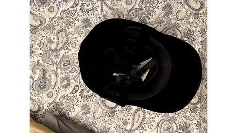 For elegant horseback riders: Black Equestrian Riding Helmet - Size Medium, Good Condition