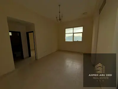 شقة غرفتين وصالة تكييف مركزي للإيجار في الجرف 1 عجمان - مساحات واسعة وحمامين - قرب المدارس وبجانب شارع عمار الرئيسي بـ 36 ألف