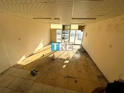 1000 SQFT SHOP WITH MEZZANINE AVAILABLE FOR RENT AJMAN INDUSTRIAL 1. .