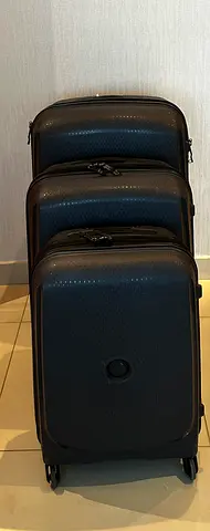 DELSEY Set of 3 Gray Hard-Shell Roll-On Luggage (Small, Medium, Large)