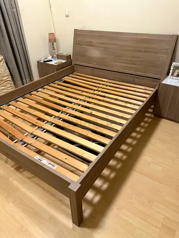 Queen wooden bed frame with slats and matching headboard. Also includes two side tables