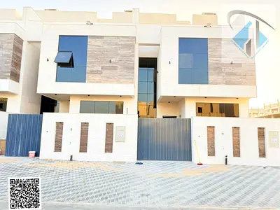 Townhouse for sale at ajman al helio2 area 5 master rooms,majlis,hall, maid room, roof freehold 0 r