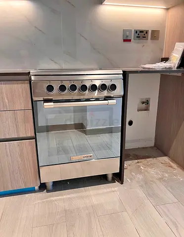 Stainless steel freestanding cooker with oven - used, good condition