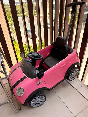 Pink Ride-On manual Toy Car to push toddlers