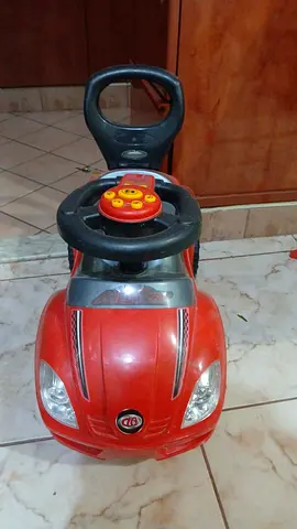 Red Push Ride-On Car with Handle and Steering Wheel - Good Condition