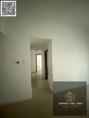 شقة غرفتين وصالة للإيجار في أبراج اللؤلؤة الراشدية عجمان | بلكونة وتكييف مركزي حديقة أطفال خلف فندق رمادا بـ 38,000 | 4 دفعات