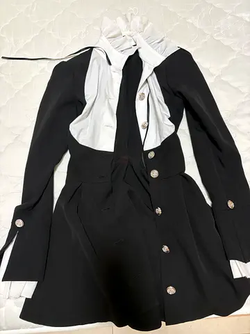 Black tailored blazer with white trim and decorative buttons - size S