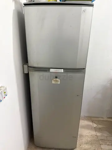 Used Silver Double-Door Refrigerator - Good Working Condition