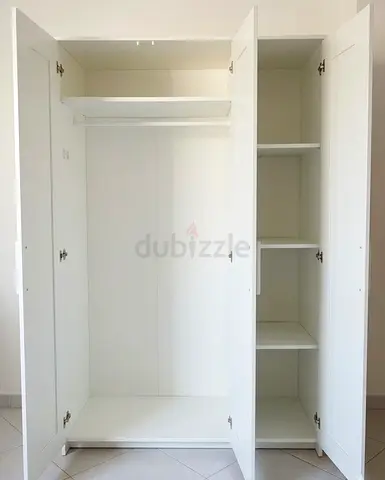 White 3-Door Wardrobe with Hanging Rail and Shelves - Excellent Condition