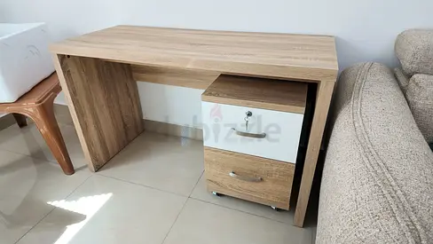 Compact wooden study desk with two-drawer mobile pedestal