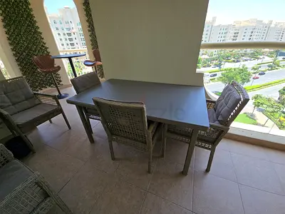 Outdoor Rattan Dining Table with 4 Chairs - Good Condition