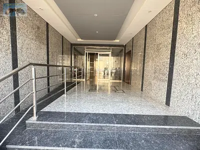 Two-bedroom apartment with a living room for annual rent in Al Jurf 2, Ajman, with a master bedroom