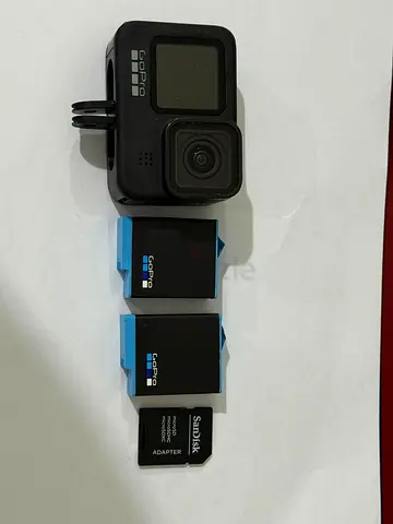 GoPro HERO 9 action camera with 2 spare batteries and SD adapter
