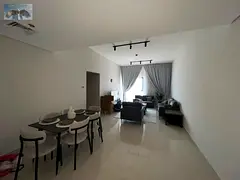 Two bedroom apartment with a living room fully furnished in a new tower in Al Rashidiya Ajman at a s