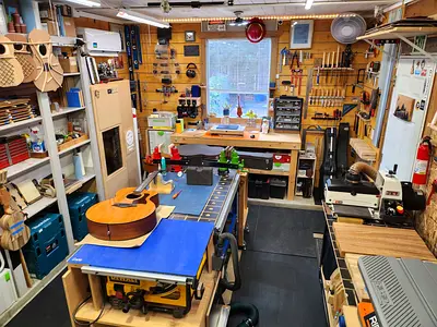 Guitar and violin servicing .
