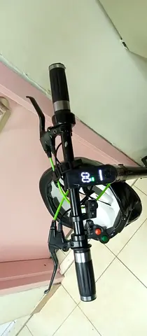 Electric Scooter, light used with helmet 🪖 going for a cool price. Urgent for sale.