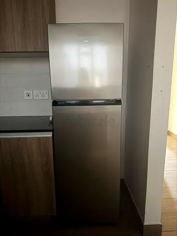 Silver top-freezer refrigerator - good condition, 2 doors