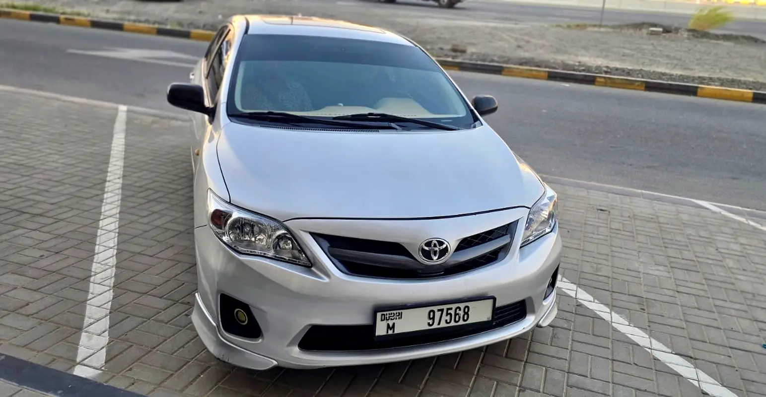 Toyota Corolla 2013 — photo 1 of 12