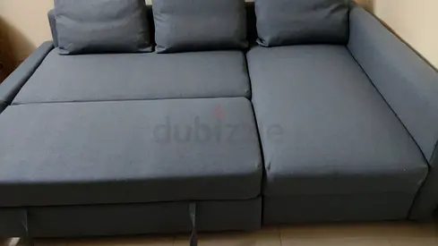 Ikea Grey fabric L-shaped sofa bed with storage (good condition)