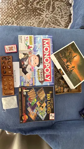 Collection of Board Games including Monopoly Travel and 100 Games