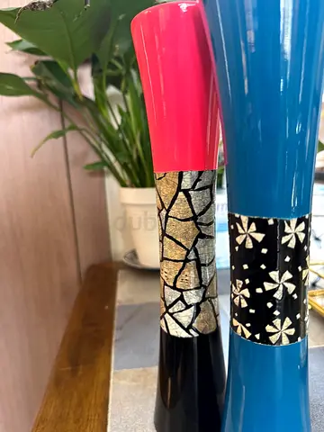 Pair of tall decorative floor vases — blue and pink with mosaic bands