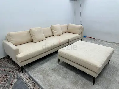 Brand new condition west elm sofa with footstool