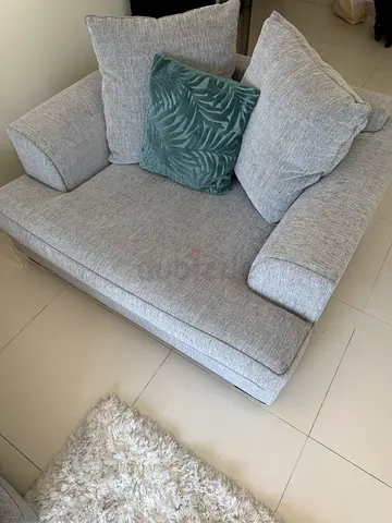 Grey L-shape sofa and large matching chair