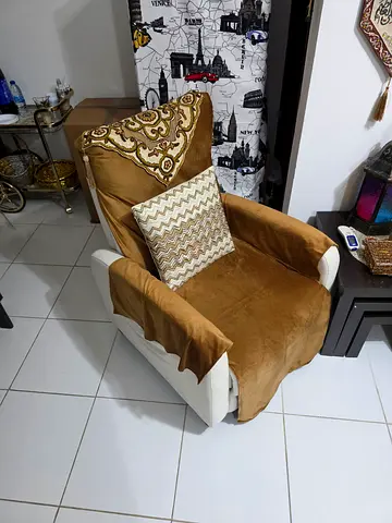 Single upholstered rocking armchair