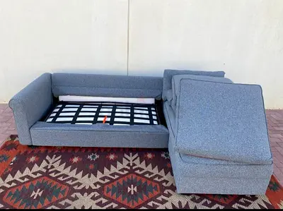 Light grey fabric gronlid L shape sofa bed with storage