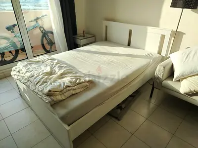 White Wooden Double Bed Frame in Good Condition. Mattress and comforter as well