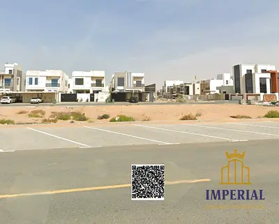 Residential and commercial plot (G+2) in Al-Bahia Corner, 3 streets, freehold, opposite Al-Aaliyah