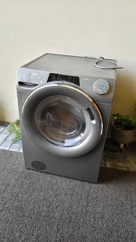 Silver front-load washing machine - good working condition