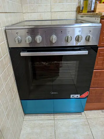 Midea Freestanding Electric Cooker with Oven - Good Working Condition AED 399