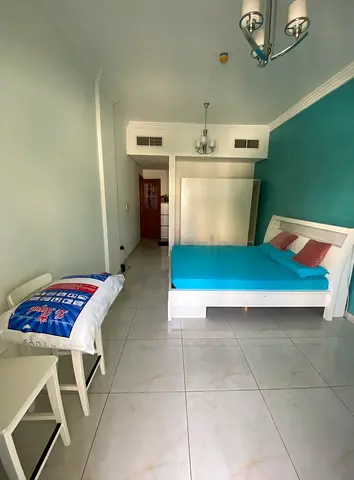 Spacious room with attached bathroom in Garhoud