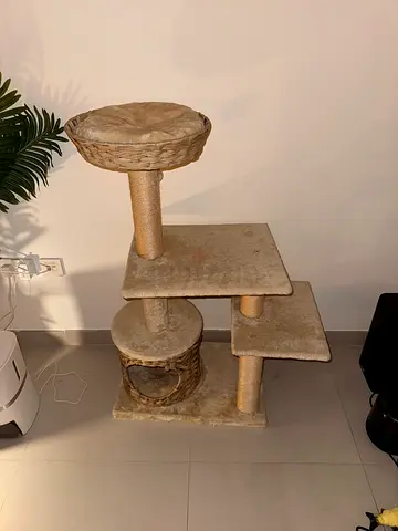 Used multi-level cat tree with scratching posts and basket