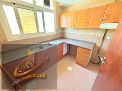 NO DEPOSIT SPECIOUS NICE ONE BHK CENTRALISED AC FAMILY BUILDING JUST 23K AL Qulayaa