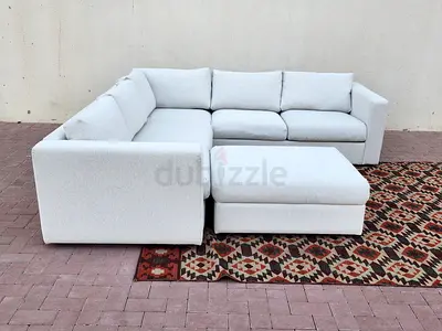 Modern Light Grey L-Shaped Sectional Sofa with Matching Ottoman