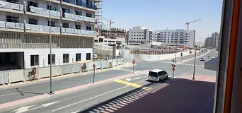SPACIOUS STUDIO APARTMENT WITH BALCONY &amp; PARKING | MODELUX TOWER 1 | WARSAN 4 PHASE 2 |