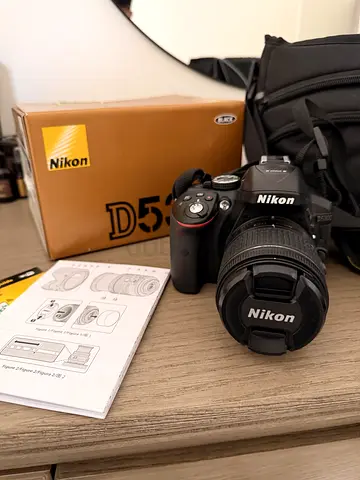 Nikon D5300 DSLR with kit lens, box and manual. Bought as gift for wife. Shuttercount 215