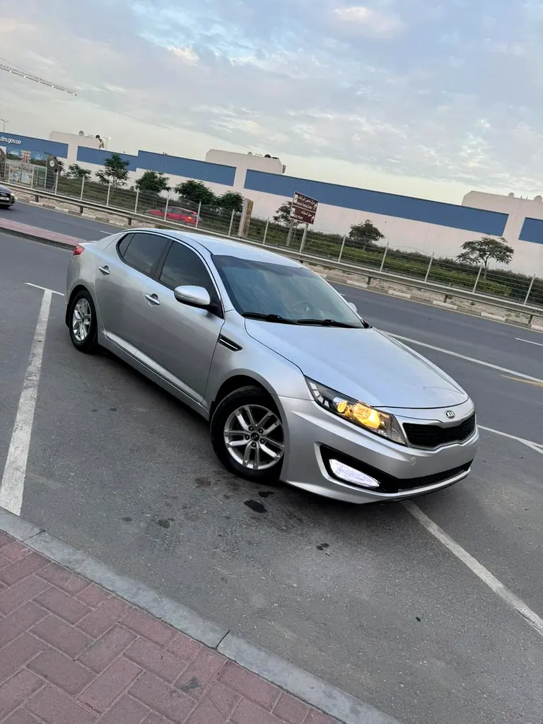 Kia Optima 2013 — photo 1 of 20